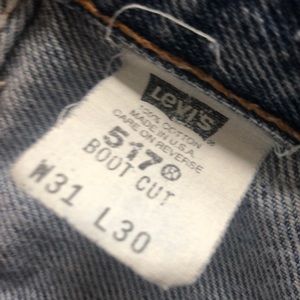Levi’s very distressed 517 jeans